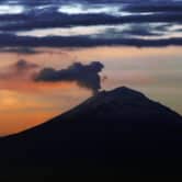 Ash and steam rise from the Popocatepetl volcano.