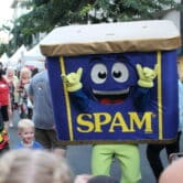 A mascot of a Spam can