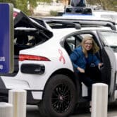 Phoenix Mayor Kate Gallego sits in the back seat of a Waymo self-driving vehicle.