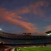 Camp Nou as the sun sets after a soccer match.