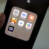 A folder of artificial intelligence chatbot apps, including ChatGPT, DeepSeek, Claude, Gemini, Copilot and Mistral AI, displayed on a smartphone screen.