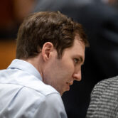 Man listens intently during hearing