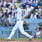 Shohei Ohtani of the Los Angeles Dodgers swings at a pitch during a game against the Arizona Diamondbacks.