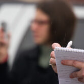 reporter with notepad